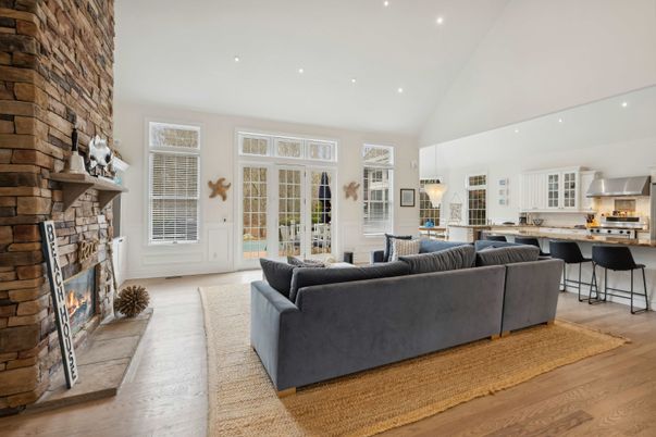 Fireplace, Interior, Kitchen, Living room, Recessed Lighting, Stone Walls, Wood Texture Flooring