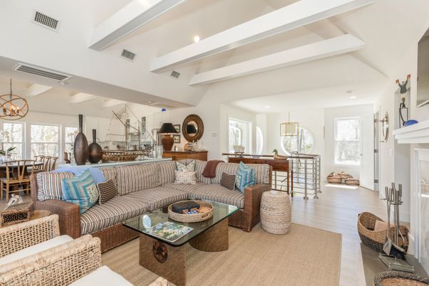 Chandelier, Dining room, Fireplace, Interior, Living room, Pendant Lights, Recessed Lighting, Wood Texture Flooring