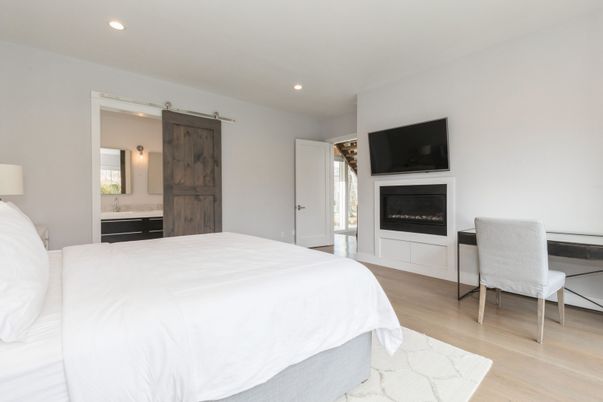 Bedroom, Fireplace, Interior, Recessed Lighting, Wood Texture Flooring