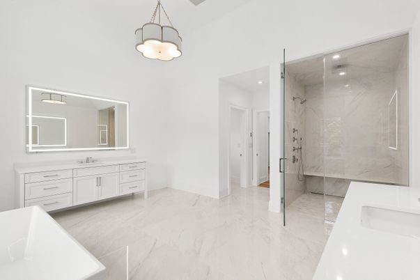 Bathroom, Dual Sink Vanities, Glass Shower, Interior, Marble, Marble Walls, Pendant Lights, Recessed Lighting