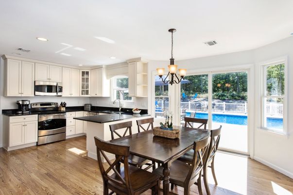 Chandelier, Dining room, Interior, Kitchen, Recessed Lighting, Stainless Steel Appliances, Wood Texture Flooring