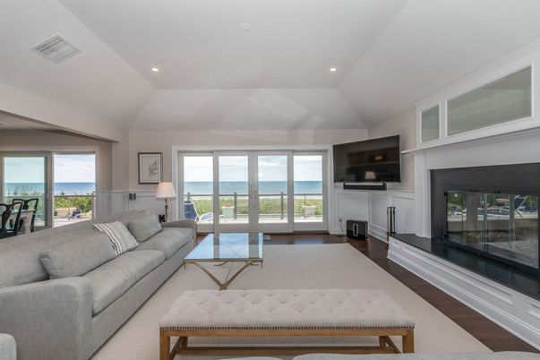 Fireplace, Interior, Living room, Recessed Lighting, Water, Wood Texture Flooring