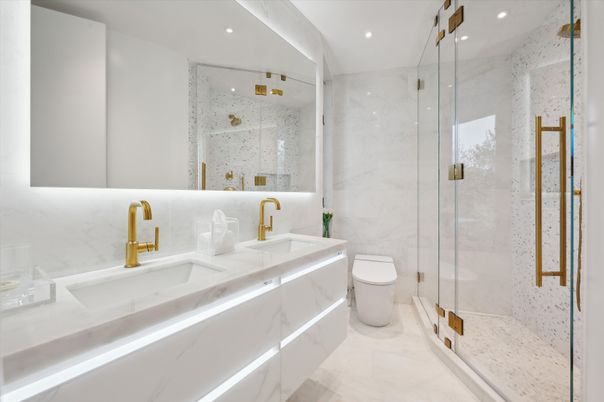 Bathroom, Dual Sink Vanities, Glass Shower, Interior, Marble, Marble Walls, Recessed Lighting