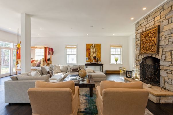 Fireplace, Interior, Living room, Recessed Lighting, Stone Walls, Wood Texture Flooring