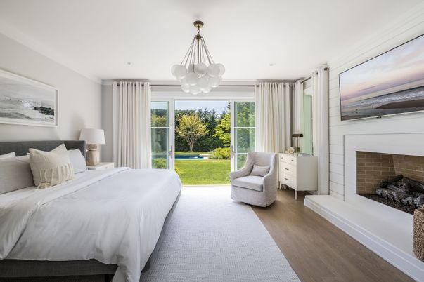 Bedroom, Fireplace, Interior, Pendant Lights, Recessed Lighting, Wood Texture Flooring