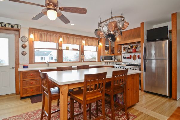 Dining room, Interior, Kitchen, Recessed Lighting, Stainless Steel Appliances, Wood Texture Flooring