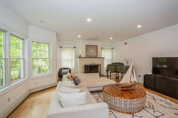 Fireplace, Interior, Living room, Piano, Recessed Lighting, Wood Texture Flooring