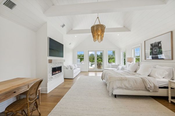 Bedroom, Fireplace, Interior, Pendant Lights, Recessed Lighting, Wood Texture Flooring