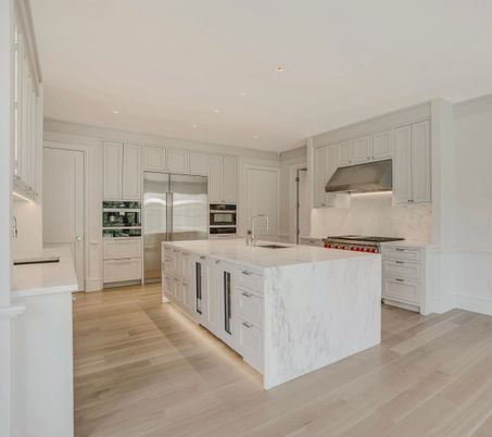 Interior, Kitchen, Marble Walls, Recessed Lighting, Stainless Steel Appliances, Wood Texture Flooring