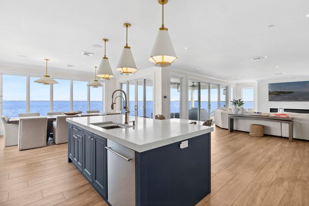 Dining room, Interior, Kitchen, Pendant Lights, Recessed Lighting, Stainless Steel Appliances, Water, Wood Texture Flooring