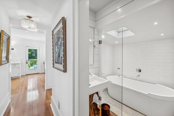 Bathroom, Chandelier, Free Standing Baths, Glass Shower, Interior, Recessed Lighting, Wood Texture Flooring