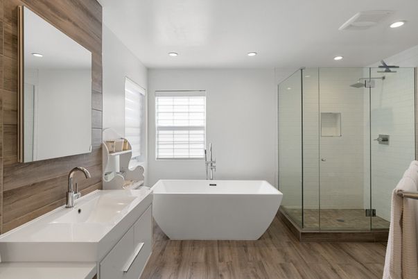 Bathroom, Free Standing Baths, Glass Shower, Interior, Recessed Lighting, Wood Texture Flooring