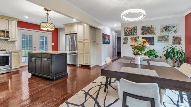Dining room, Interior, Kitchen, Pendant Lights, Recessed Lighting, Stainless Steel Appliances, Wood Texture Flooring