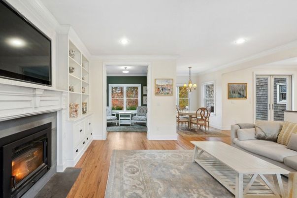Chandelier, Dining room, Fireplace, Interior, Living room, Recessed Lighting, Wood Texture Flooring