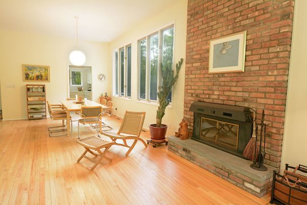 Dining room, Fireplace, Interior, Pendant Lights, Stone Walls, Wood Texture Flooring