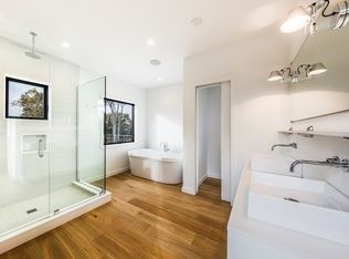Bathroom, Dual Sink Vanities, Free Standing Baths, Glass Shower, Interior, Recessed Lighting, Wood Texture Flooring