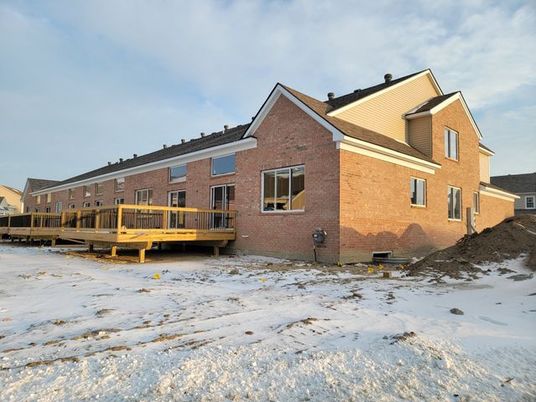 Exterior, Facade, Brick Facade, Log Home