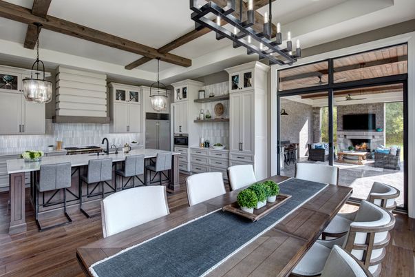 Dining room, Fireplace, Interior, Kitchen, Pendant Lights, Stainless Steel Appliances, Stone Walls, Wooden Beams, Wood Texture Flooring