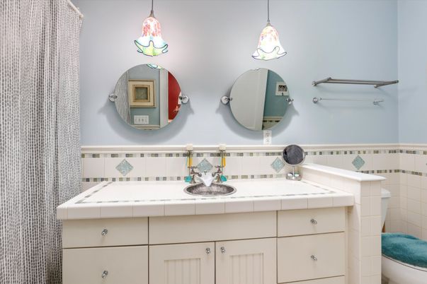 Bathroom, Dual Sink Vanities, Interior, Pendant Lights, Tile Countertops