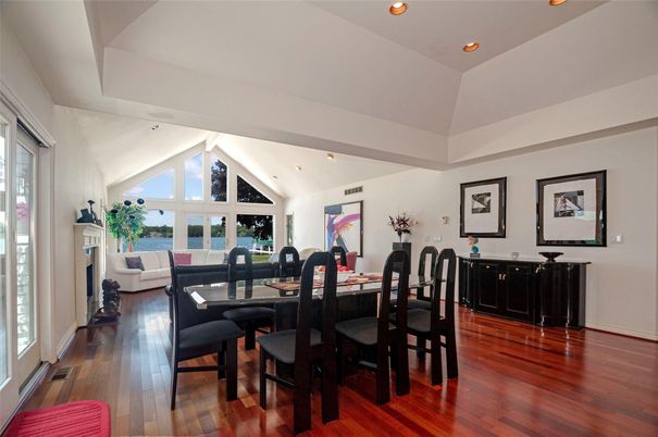 Dining room, Fireplace, Interior, Living room, Recessed Lighting, Water, Wood Texture Flooring