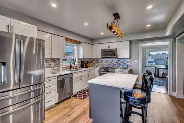 Interior, Kitchen, Recessed Lighting, Stainless Steel Appliances, Wood Texture Flooring