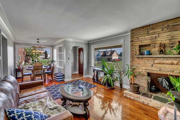 Dining room, Fireplace, Interior, Living room, Pendant Lights, Stone Walls, Wood Texture Flooring
