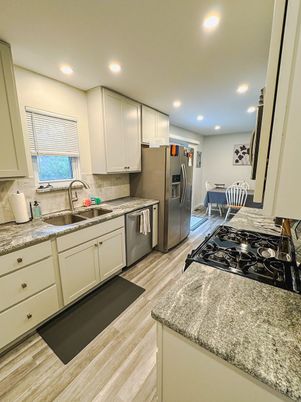 Dining room, Interior, Kitchen, Recessed Lighting, Stainless Steel Appliances, Wood Texture Flooring