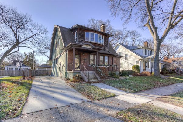 Backyard, Exterior, Facade, Brick Facade, American Foursquare