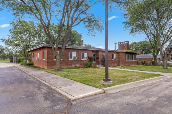 Exterior, Facade, Brick Facade, Log Home