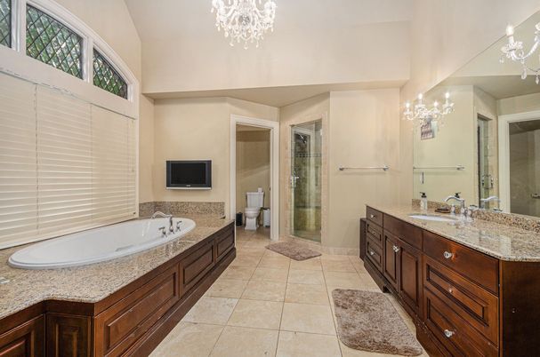 Bathroom, Chandelier, Dual Sink Vanities, Glass Shower, Interior