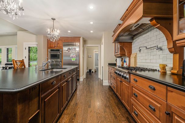 Chandelier, Interior, Kitchen, Recessed Lighting, Stainless Steel Appliances, Wood Texture Flooring