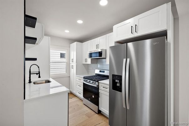 Interior, Kitchen, Recessed Lighting, Stainless Steel Appliances, Wood Texture Flooring
