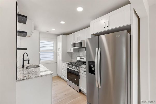 Interior, Kitchen, Recessed Lighting, Stainless Steel Appliances, Wood Texture Flooring