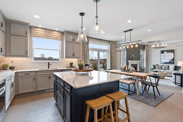 Chandelier, Dining room, Fireplace, Interior, Kitchen, Living room, Pendant Lights, Recessed Lighting, Stainless Steel Appliances, Wood Texture Flooring