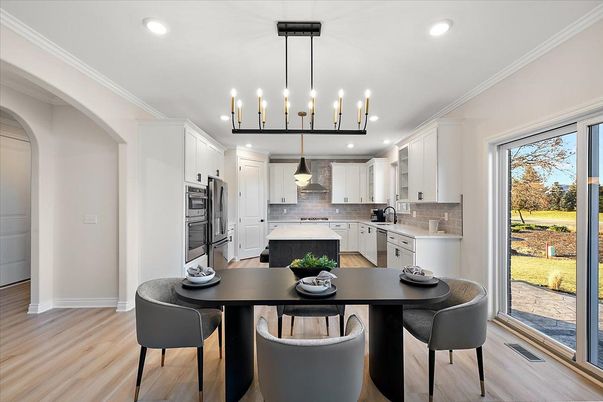 Dining room, Interior, Kitchen, Pendant Lights, Recessed Lighting, Stainless Steel Appliances, Wood Texture Flooring