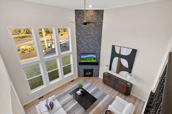 Fireplace, Interior, Living room, Pendant Lights, Recessed Lighting, Stone Walls, Wood Texture Flooring