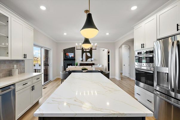 Dining room, Interior, Kitchen, Pendant Lights, Recessed Lighting, Stainless Steel Appliances, Wood Texture Flooring