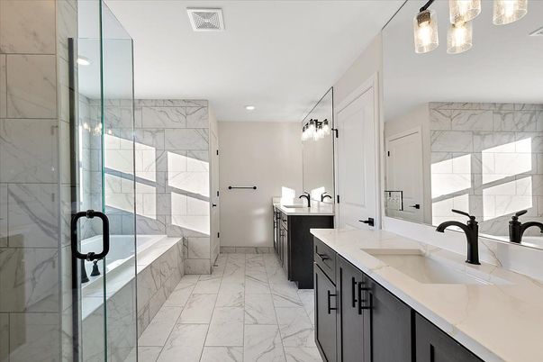 Bathroom, Dual Sink Vanities, Glass Shower, Interior, Marble, Marble Walls, Recessed Lighting