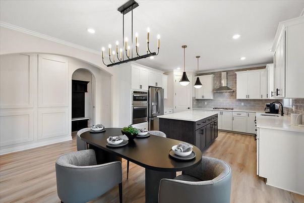 Dining room, Interior, Kitchen, Pendant Lights, Recessed Lighting, Stainless Steel Appliances, Wood Texture Flooring