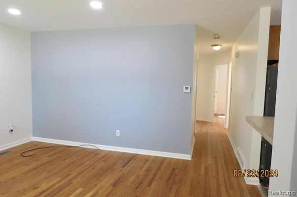 Empty room, Fireplace, Interior, Recessed Lighting, Wood Texture Flooring