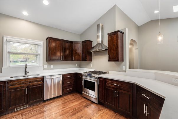 Interior, Kitchen, Pendant Lights, Recessed Lighting, Stainless Steel Appliances, Wood Texture Flooring