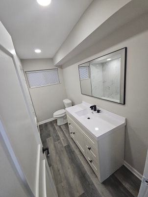 Bathroom, Dual Sink Vanities, Interior, Recessed Lighting, Wood Texture Flooring