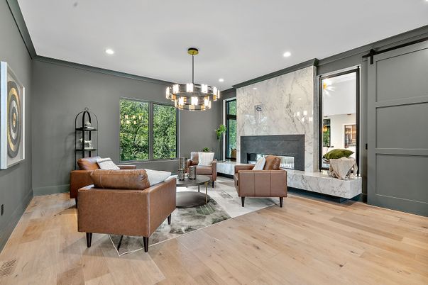 Fireplace, Interior, Living room, Marble Walls, Pendant Lights, Recessed Lighting, Wood Texture Flooring