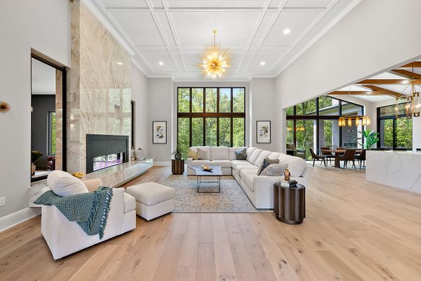 Chandelier, Dining room, Fireplace, Interior, Living room, Pendant Lights, Recessed Lighting, Wood Texture Flooring