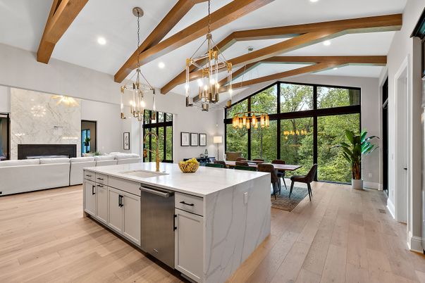Chandelier, Dining room, Fireplace, Interior, Kitchen, Living room, Pendant Lights, Recessed Lighting, Stainless Steel Appliances, Wooden Beams, Wood Texture Flooring