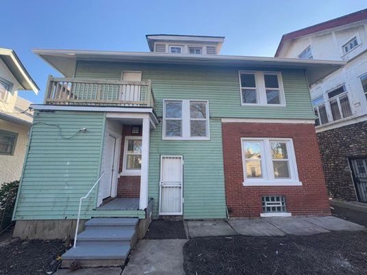 Exterior, Facade, Brick Facade, American Foursquare