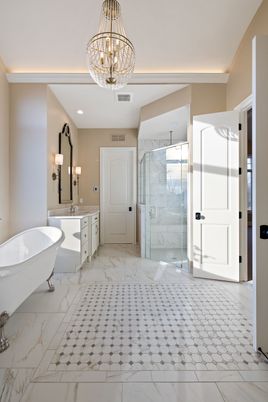 Bathroom, Chandelier, Free Standing Baths, Glass Shower, Interior, Marble, Marble Walls, Recessed Lighting