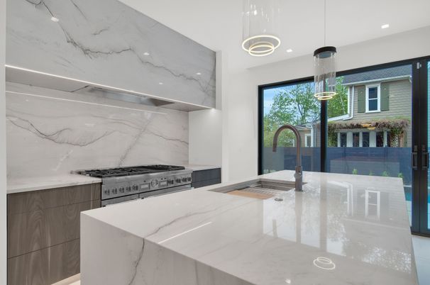 Interior, Kitchen, Marble Walls, Pendant Lights, Recessed Lighting, Stainless Steel Appliances