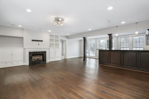 Empty room, Fireplace, Interior, Pendant Lights, Recessed Lighting, Wood Texture Flooring