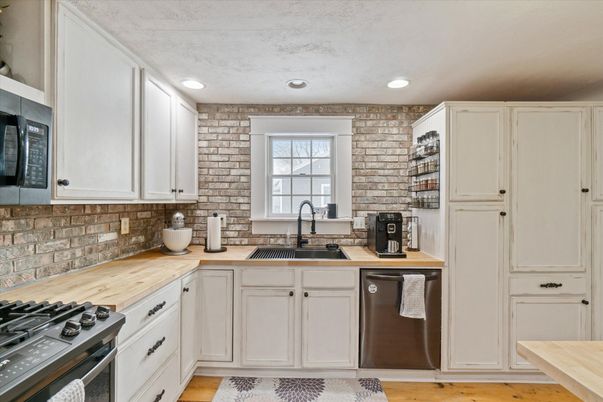 Interior, Kitchen, Recessed Lighting, Stainless Steel Appliances, Stone Walls, Wood Texture Flooring
